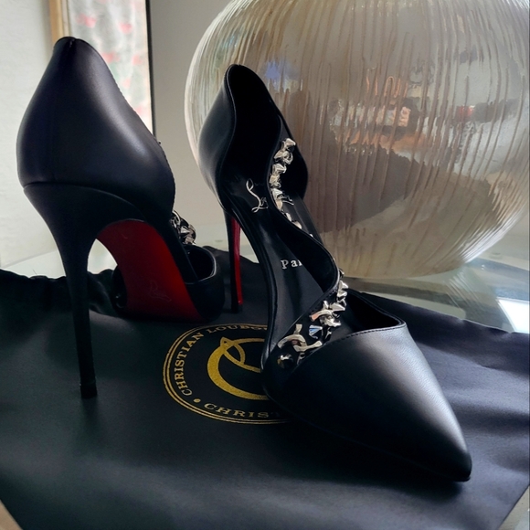 Christian Louboutin - Picture 1 of 7